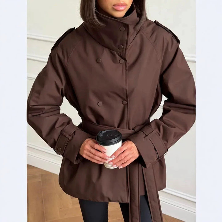 Women Short Technical Trench with High Collar Flap, Double Press Button Placket and Tailoring Tie Belt Amarae