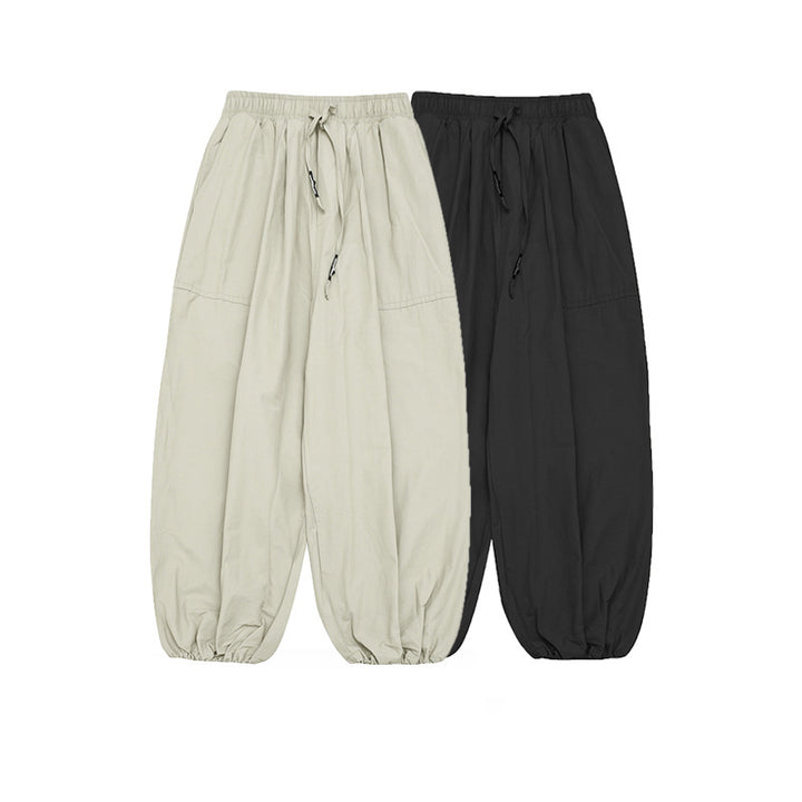 Unisex Wide Harem Pants with Drawstring Waistband, Elastic Leg Openings and Oversized Silhouette Amarae