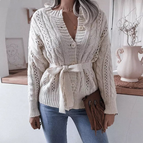 Gilet pour dames avec motif en cable délavé et ceinture à la taille Chic & Stil