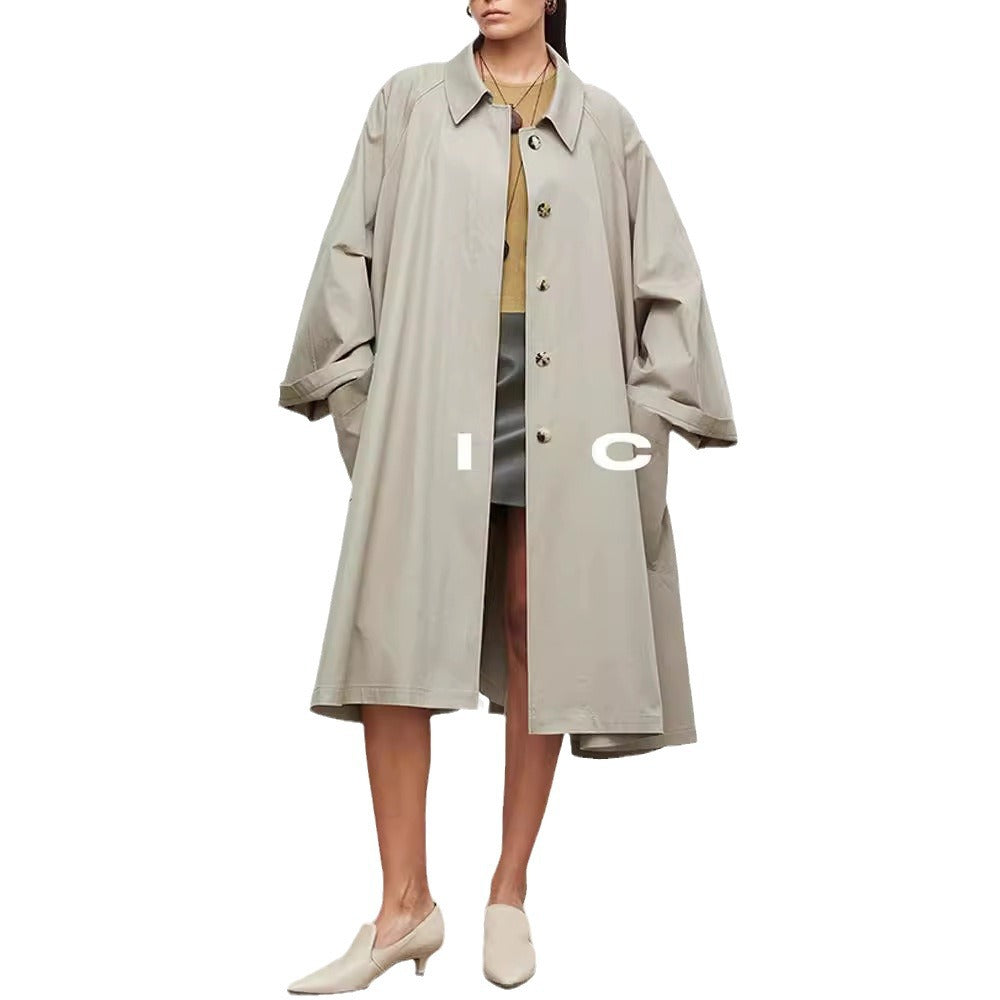 Manteau de trench décontracté pour femmes avec des manches surdimensionnées et des détails de boutons Chic & Stil