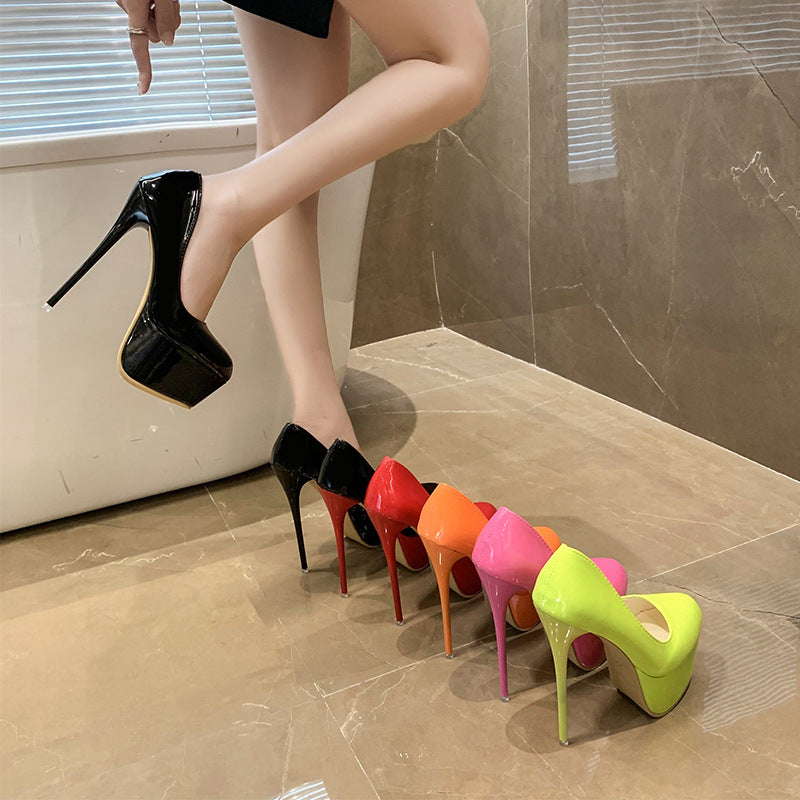 Ladies platform pumps with shiny upper material and high stiletto heel Lune London