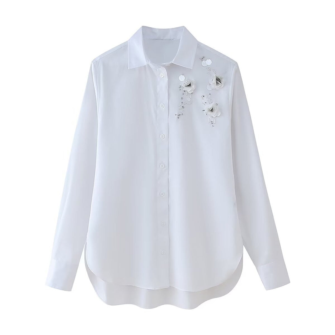 Blouse expertly designed for women with chic floral appliqués and style
