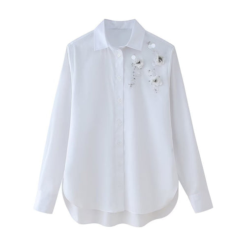 Blouse expertly designed for women with chic floral appliqués and style
