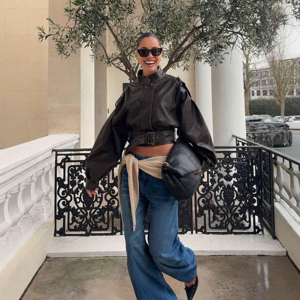 Women Short Cut Faux Leather Biker Jacket with Stand Collar, Waist Belt and Voluminous Sleeves Amarae