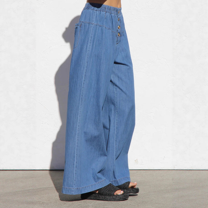 Wide denim pants for women with elastic waistband and button details Chic & Stil