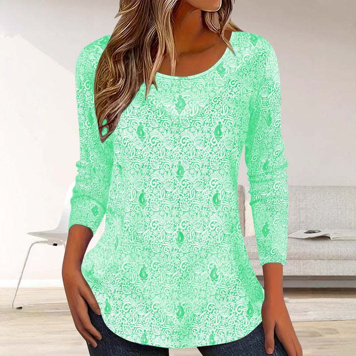 Simple long sleeve women's blouse with floral design and round neckline Lune London