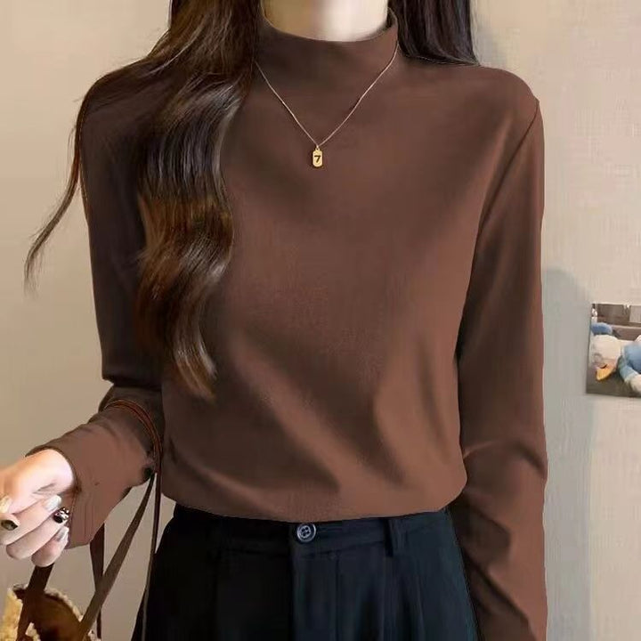 Chemise à manches longues pour femmes avec col montant et fine structure Chic & Stil