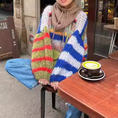 Comfortable knit sweater for women with flared sleeves and a colorful striped pattern Lune London