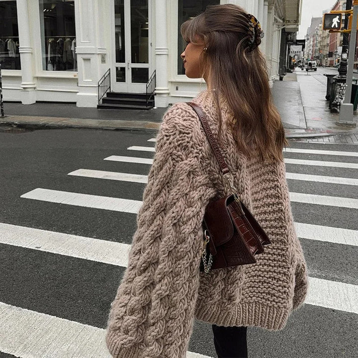 Oversized knitted sweater for women with textured cable design Lune London
