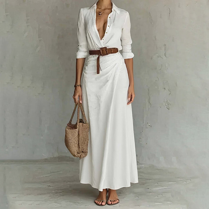 Robe maxi pour femmes avec décolleté en V profond et détails définissant la taille Chic & Stil