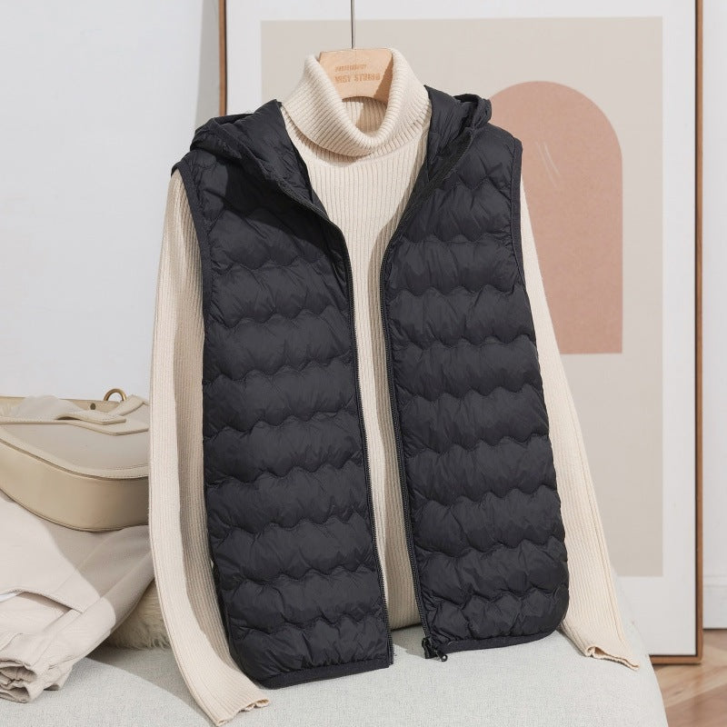 Women Ultra-light Hooded Quilted Vest with Ergonomic Wave Quilting and Compact Packing Format Amarae