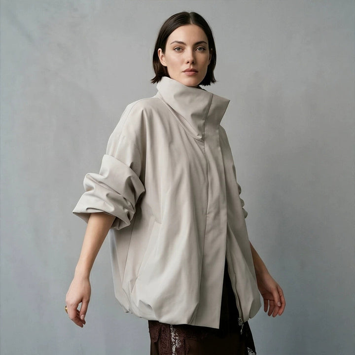 Women's boxy short quilted jacket with high asymmetric stand-up collar Amarae