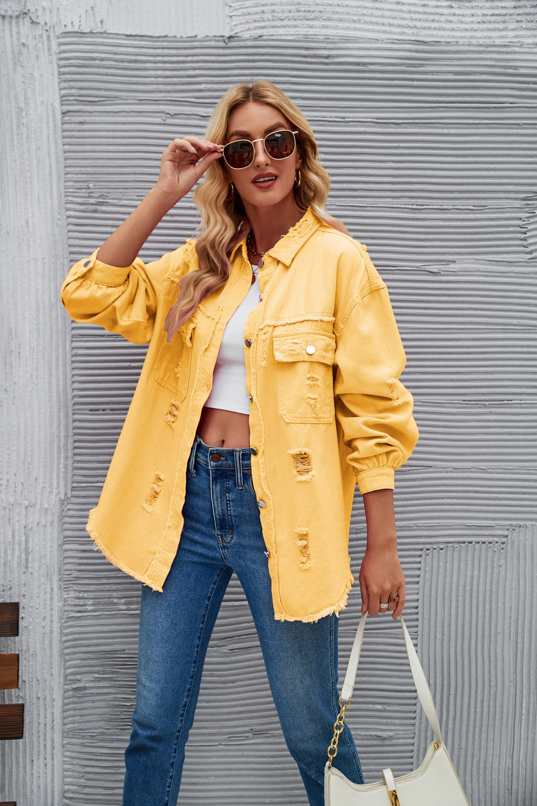 Oversized denim jacket for women with modern distressed details Lune London