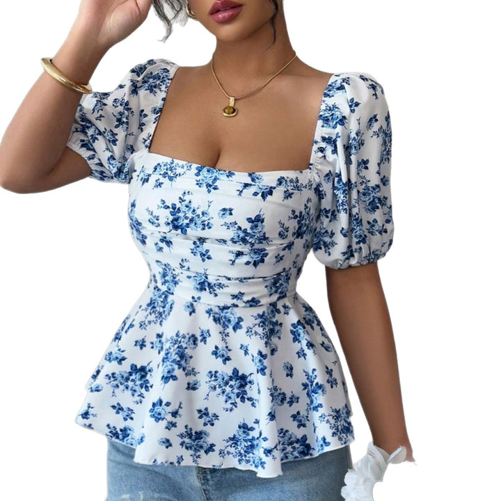 Women’s blouse with ruffle and floral design Lune London