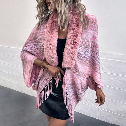 Elegant poncho for ladies with luxurious faux fur collar and fringed hem Amarae