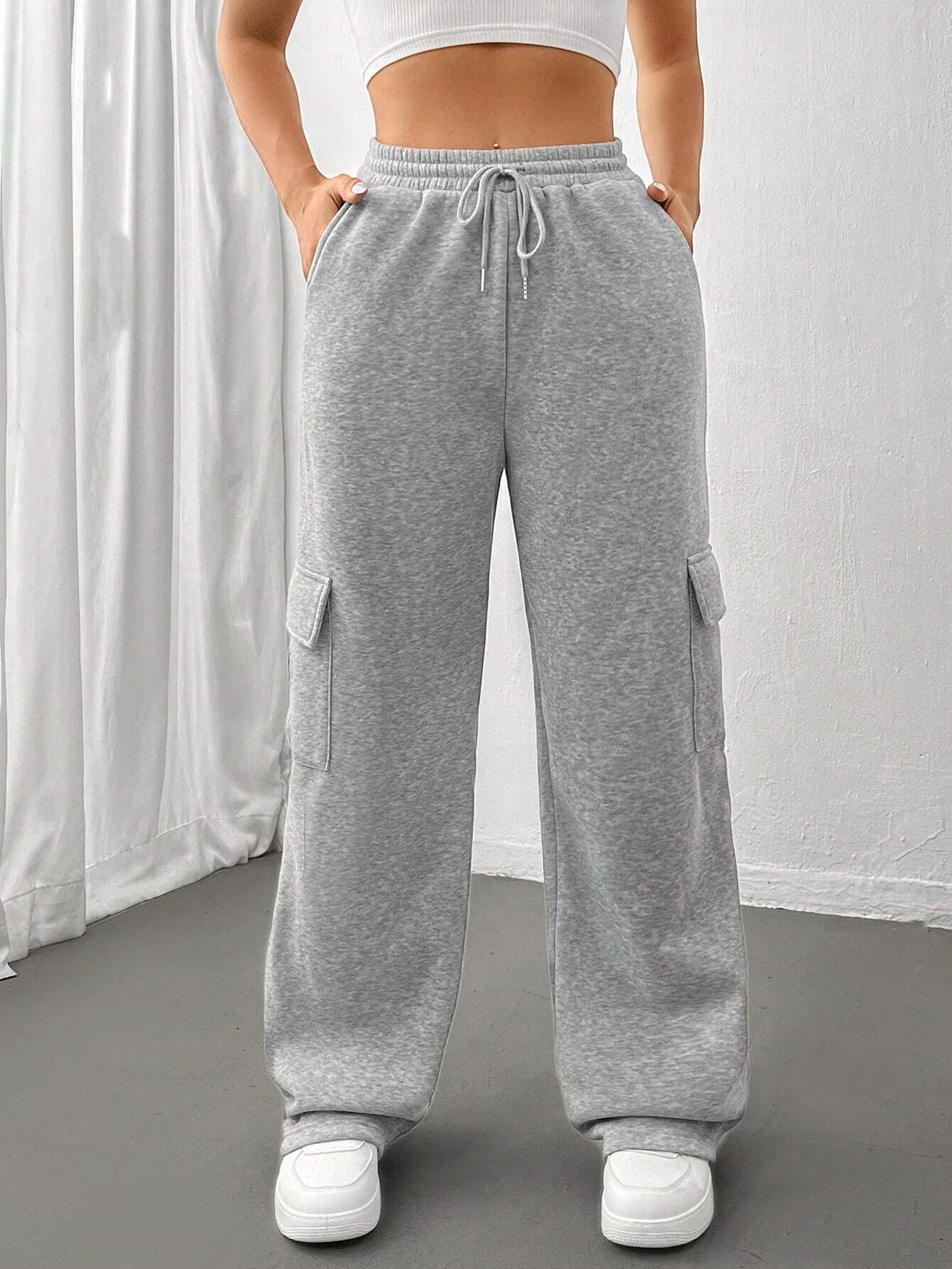 Ladies cargo jogging pants with high elastic waistband, drawstring, and wide leg Amarae