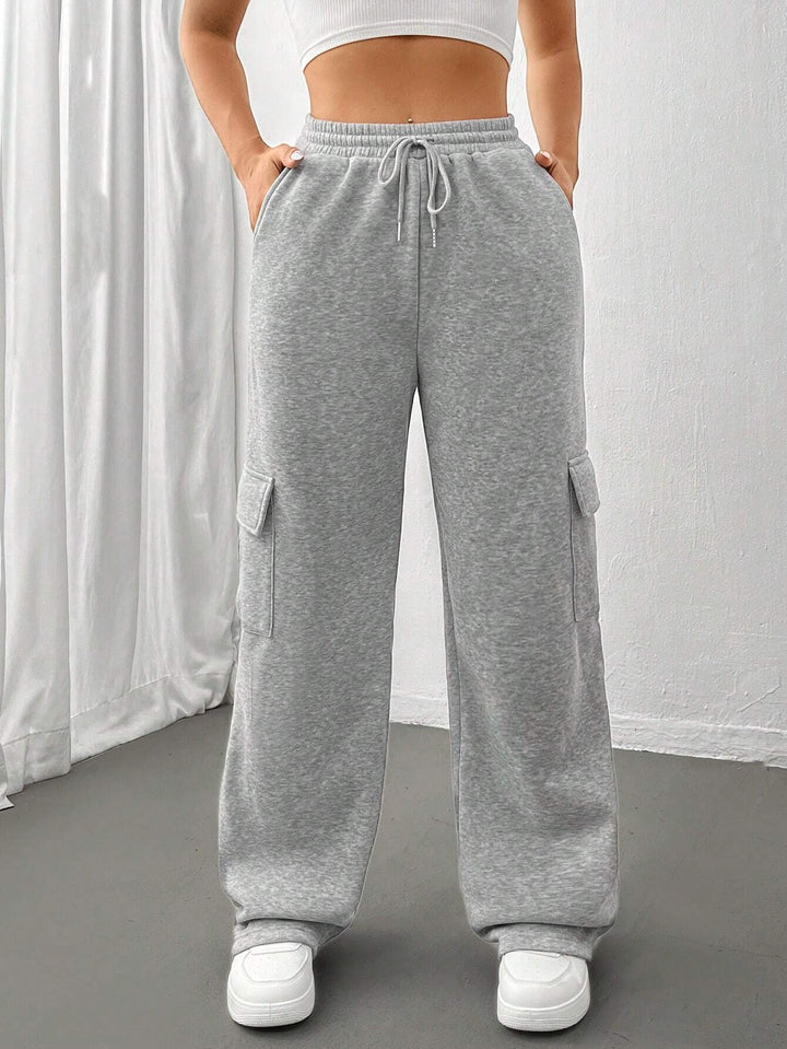 Ladies cargo jogging pants with high elastic waistband, drawstring, and wide leg Amarae