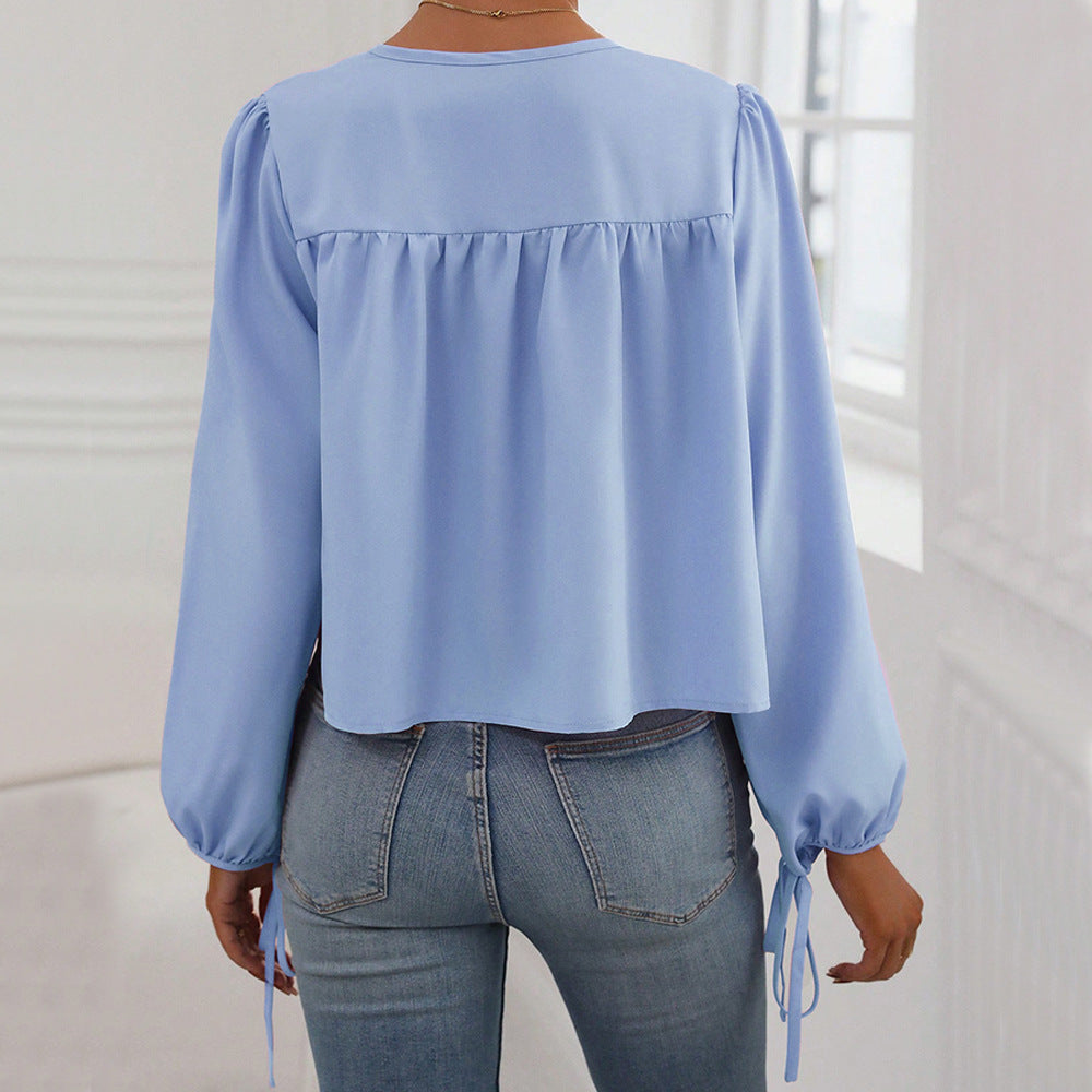 Blouse pour femmes avec lien décoratif et coupe décontractée Chic & Stil