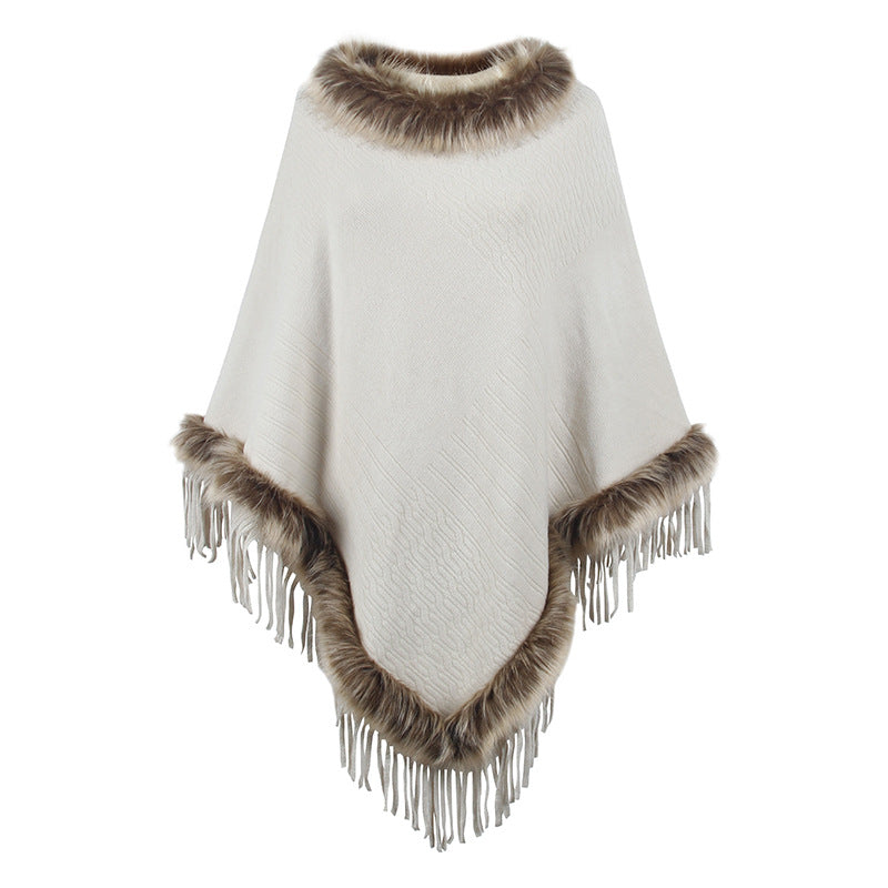 Ladies elegant poncho with luxurious faux fur collar and decadent fringes Lune London
