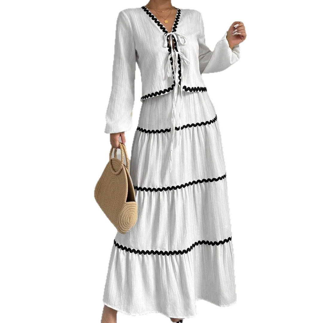Maxi dress for women with playful lace-up neckline and elegant ruffled skirt Lune London