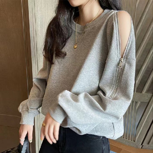 Women's casual oversized pullover with open shoulders and modern design