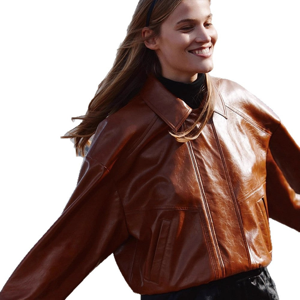Women's short blazer made of vegan smooth leather with boxy silhouette and concealed snap button placket Amarae