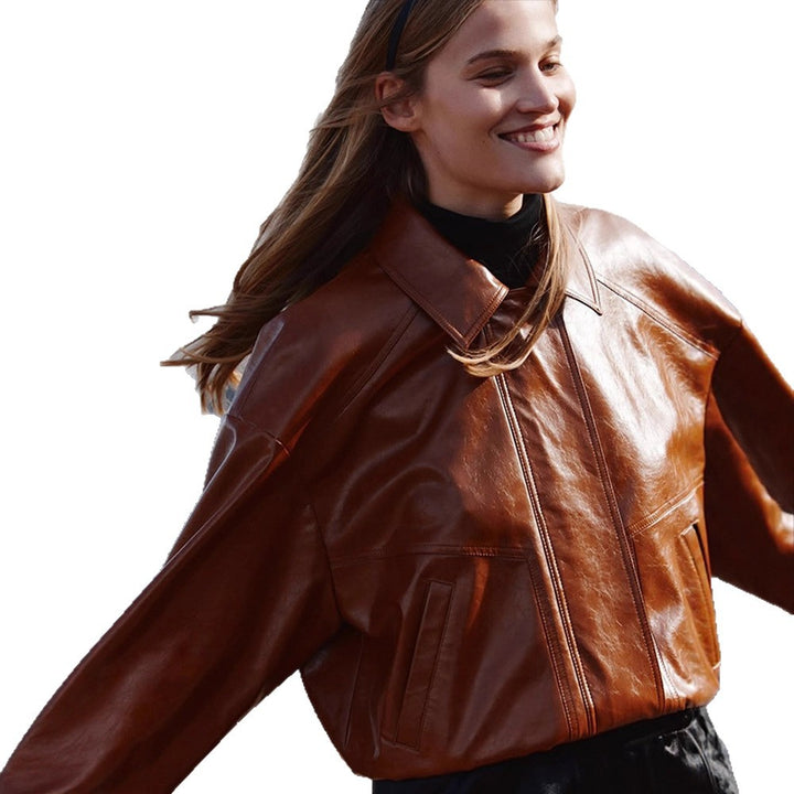 Women's short blazer made of vegan smooth leather with boxy silhouette and concealed snap button placket Amarae