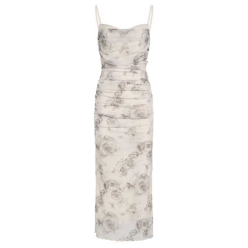Maxi fitted dress for women with refined ruffles and a floral pattern Lune London