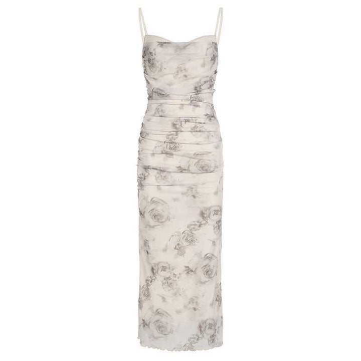 Maxi fitted dress for women with refined ruffles and a floral pattern Lune London