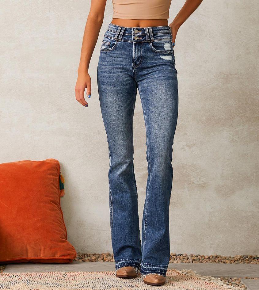 High-waisted flared jeans for women with trendy ripped details Chic & Stil