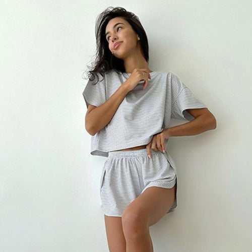 Ladies stylish casual outfit with short sleeve crop top and chic shorts