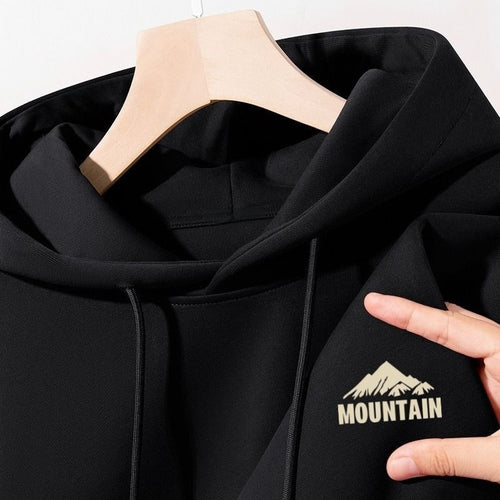 Women's hoodie with modern mountain motif and practical pockets Chic & Stil