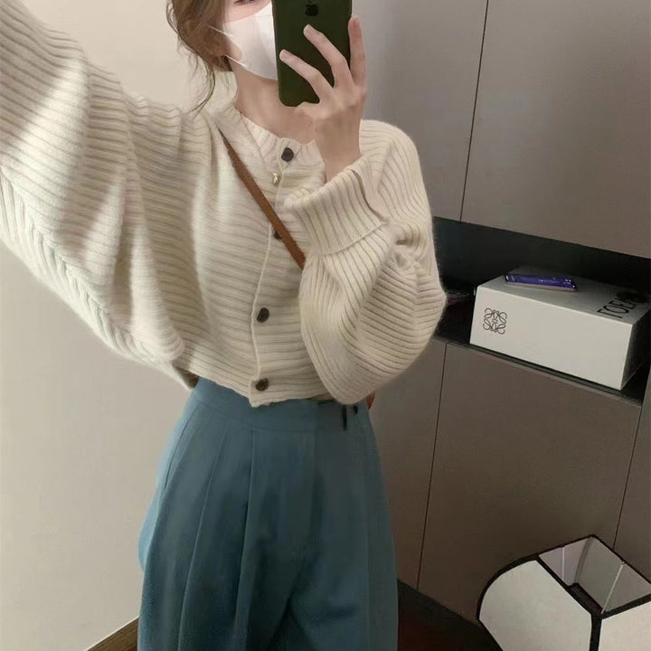 Fashion knitted jacket for women with button detail and structured design Lune London