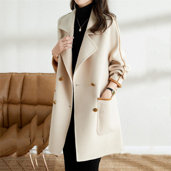 Trendy double-breasted coat for women with elegant details and practical pockets Lune London