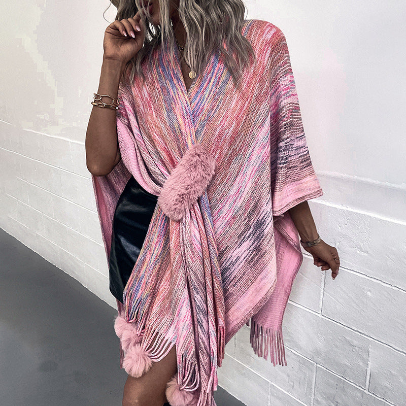 Ladies fashionable poncho with luxurious faux fur trim and creative fringes Lune London