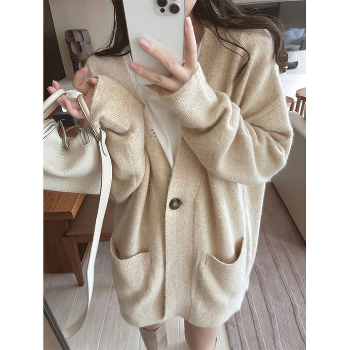 Cardigan femme confortable avec grandes poches et fermeture à boutons continue Chic & Stil