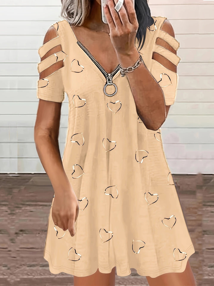Leisure dress for women with cutout sleeves and a heart-shaped pattern Lune London