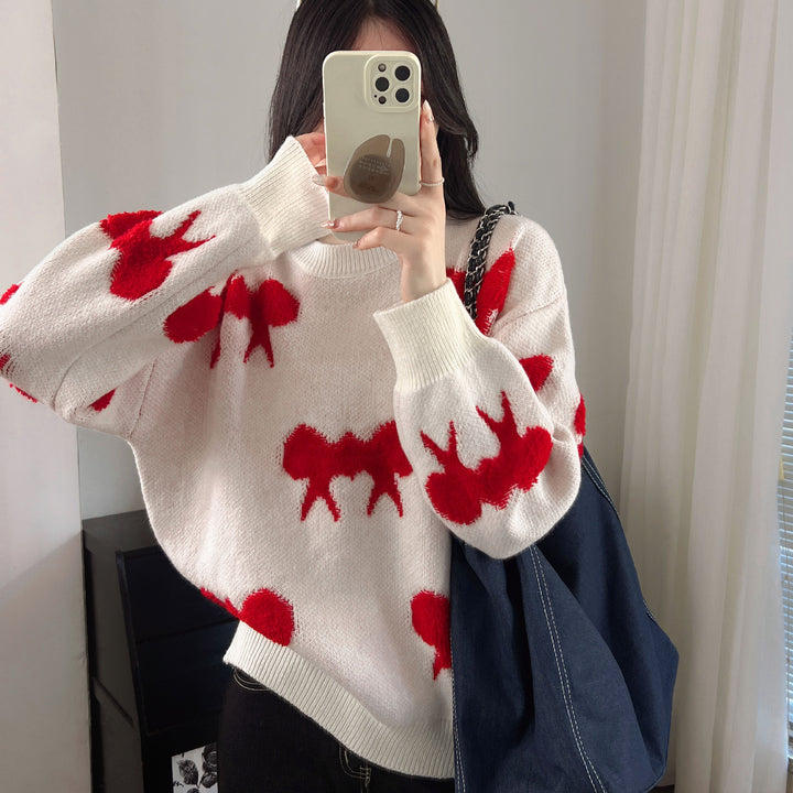 Cozy knitted sweater for women with playful bow pattern Lune London