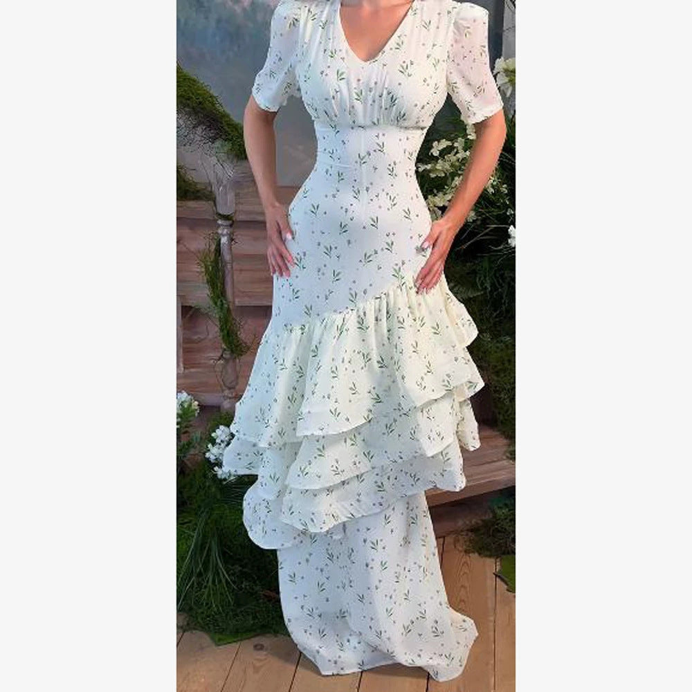 Women’s maxi dress in vintage-romantic style with asymmetric ruffles and puff sleeves Amarae