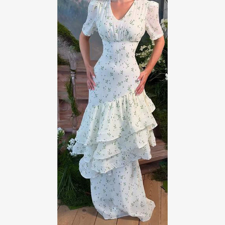 Women’s maxi dress in vintage-romantic style with asymmetric ruffles and puff sleeves Amarae