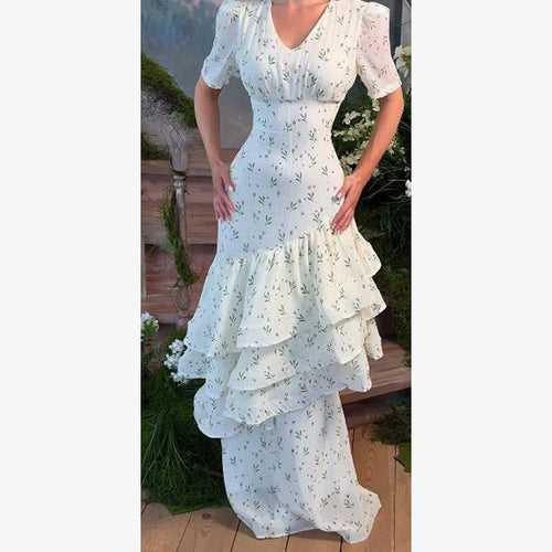 Women’s maxi dress in vintage-romantic style with asymmetric ruffles and puff sleeves Amarae