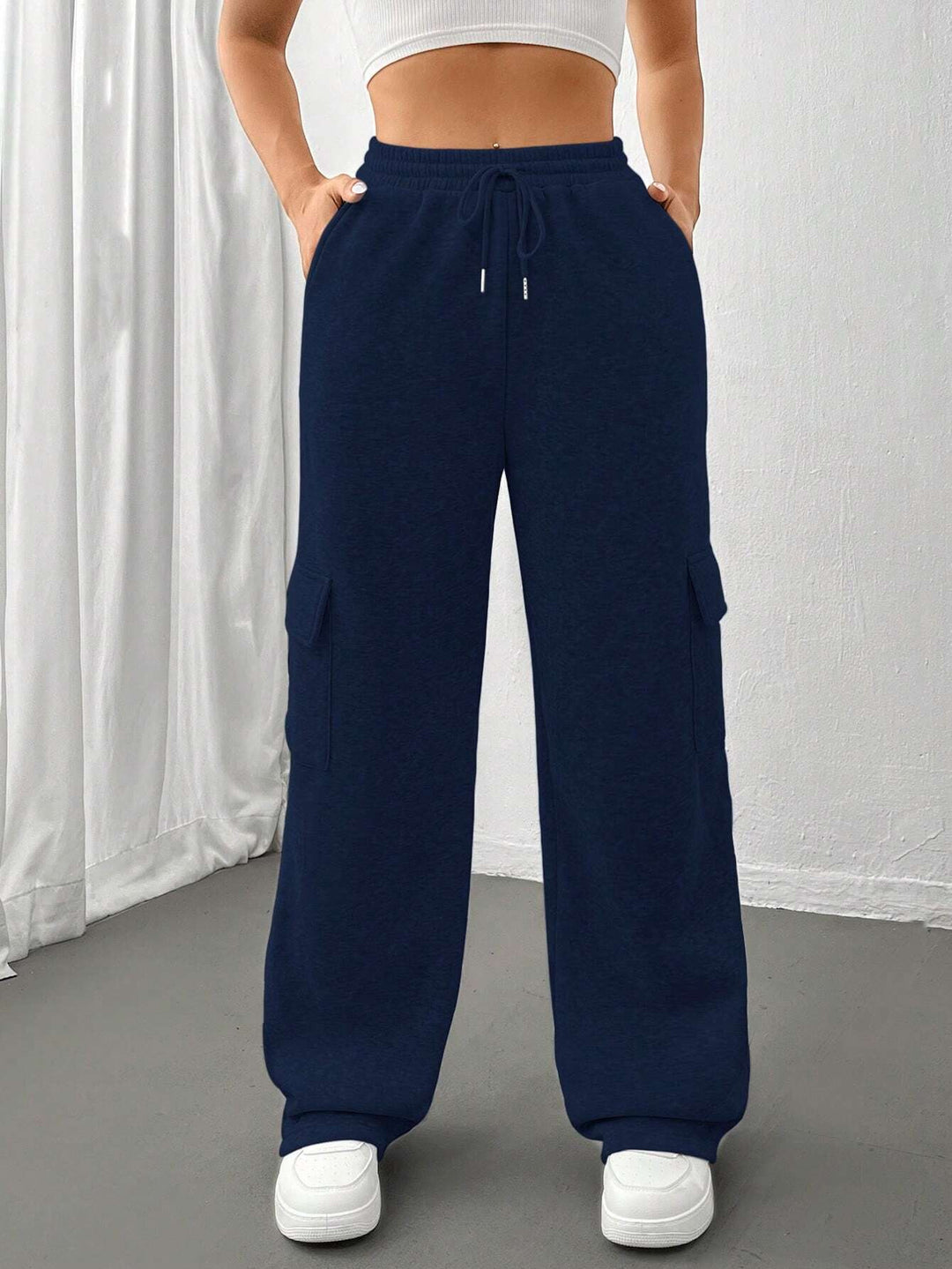 Ladies cargo jogging pants with high elastic waistband, drawstring, and wide leg Amarae