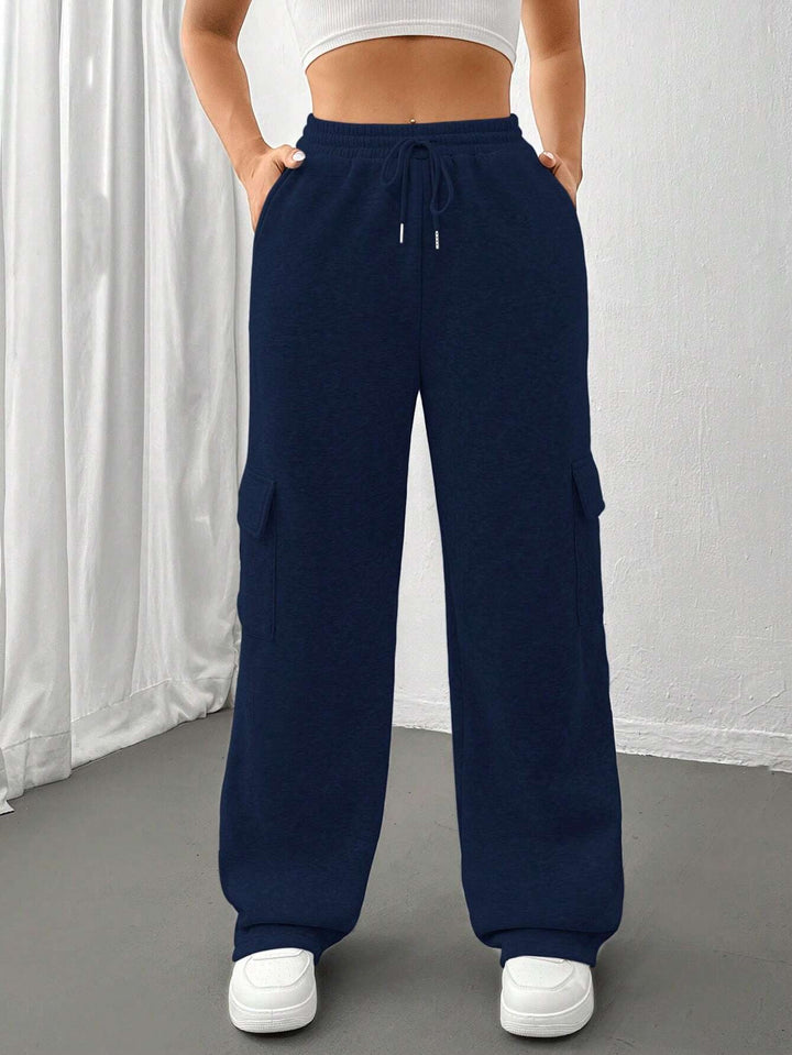 Ladies cargo jogging pants with high elastic waistband, drawstring, and wide leg Amarae