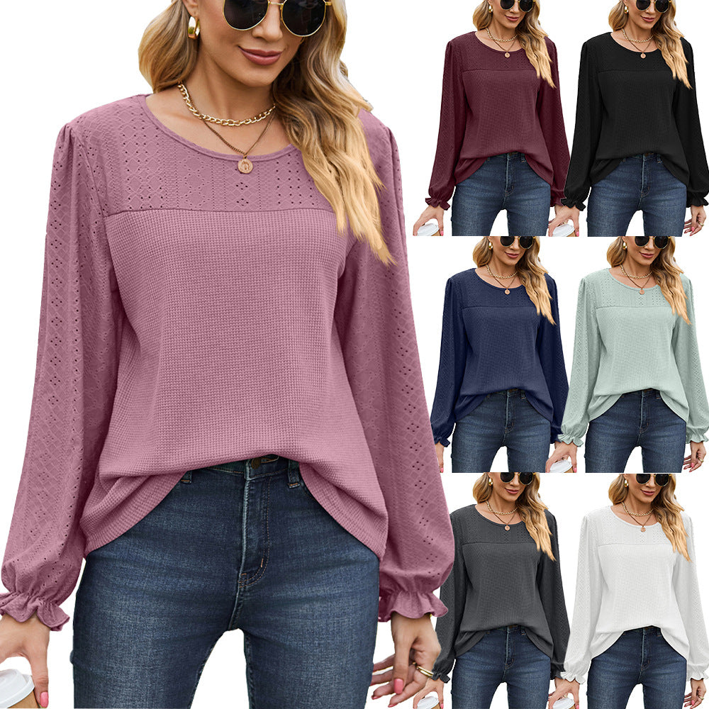 Women's top with textured design and elegant puff sleeves Amarae