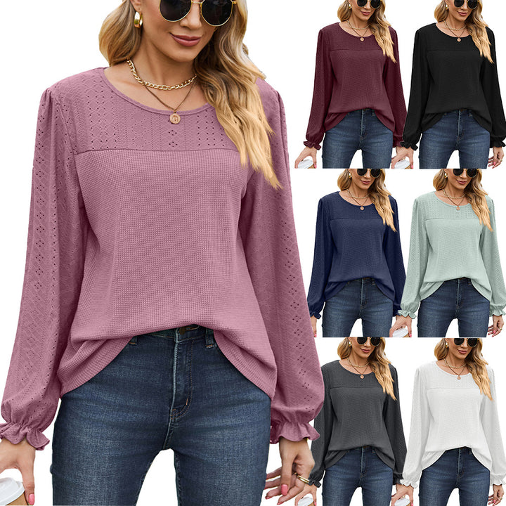 Women's top with textured design and elegant puff sleeves Amarae