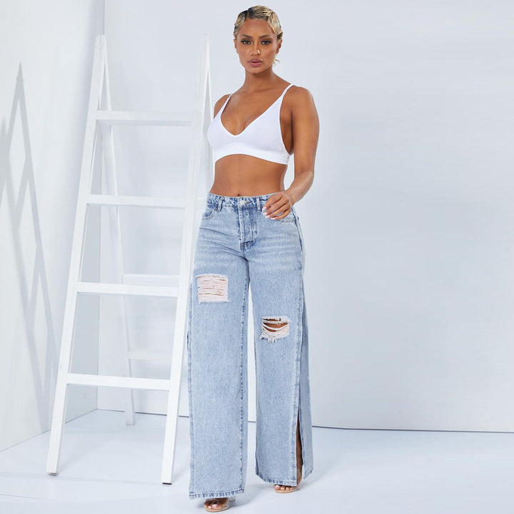 Ladies wide high-waist jeans with side leg slits, destroyed knee, and shaping waistband Amarae