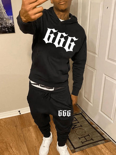 Hoodie and Jogging Pants Set for Men with Chic and Stylish Graphic Statement Print