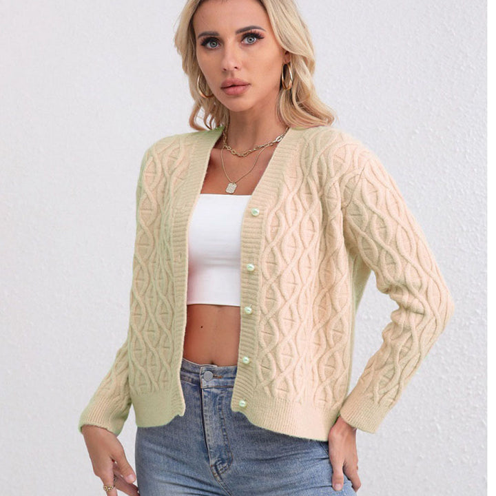 Women's knit jacket with modern cable pattern and pastel button details Lune London