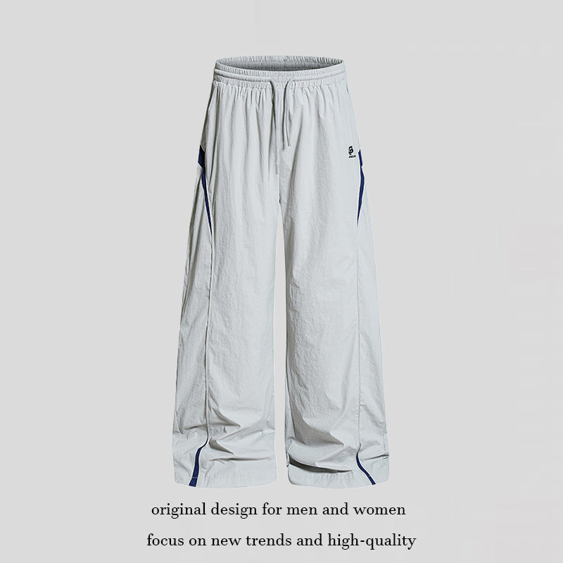 Women Wide Nylon Palazzo Training Pants with Drawstring, Side Contrast Triangles and Adjustable Hem Amarae