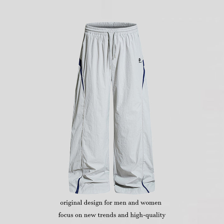 Women Wide Nylon Palazzo Training Pants with Drawstring, Side Contrast Triangles and Adjustable Hem Amarae